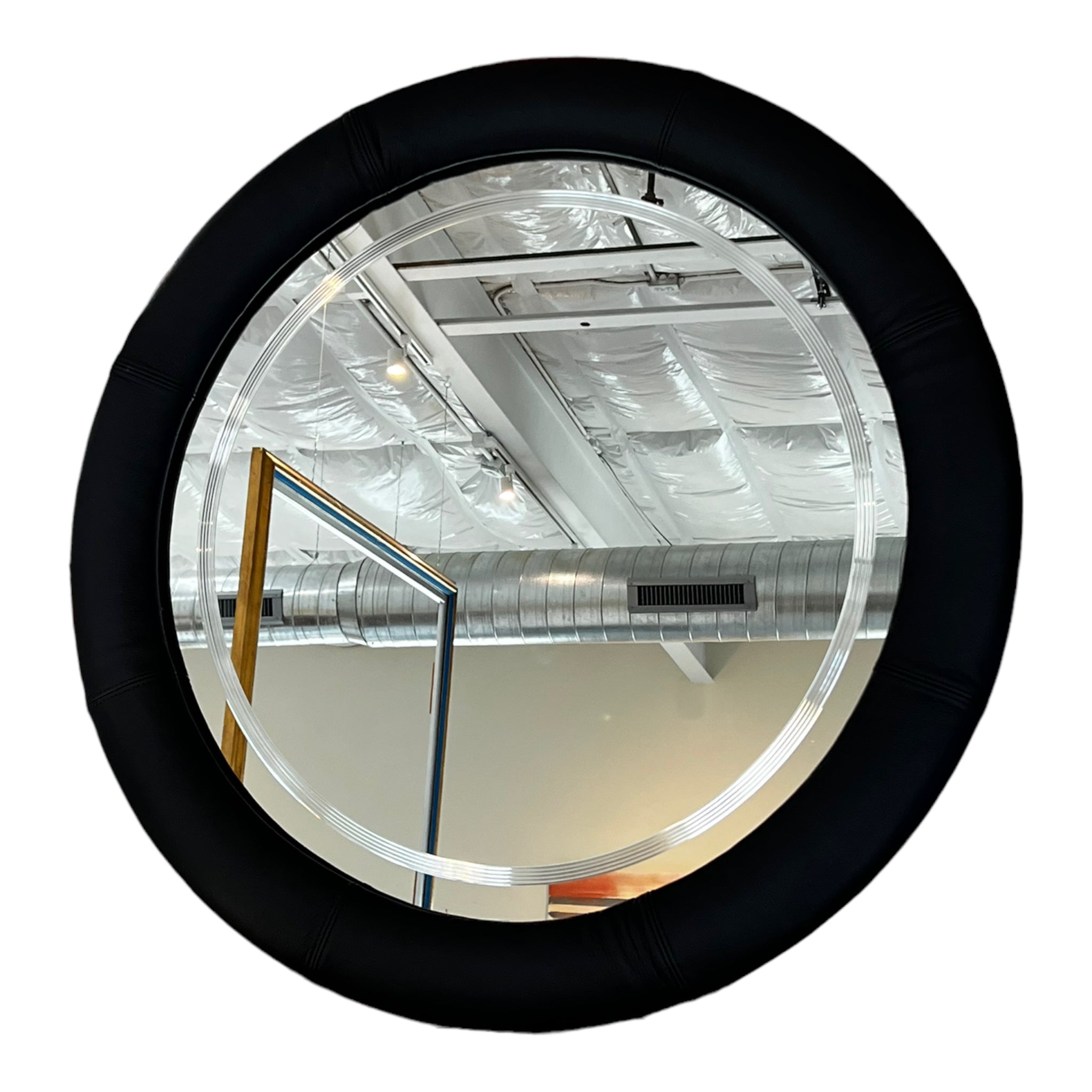 Round postmodern mirror with minimalist design, sleek frame, and contemporary style. Excellent vintage condition.