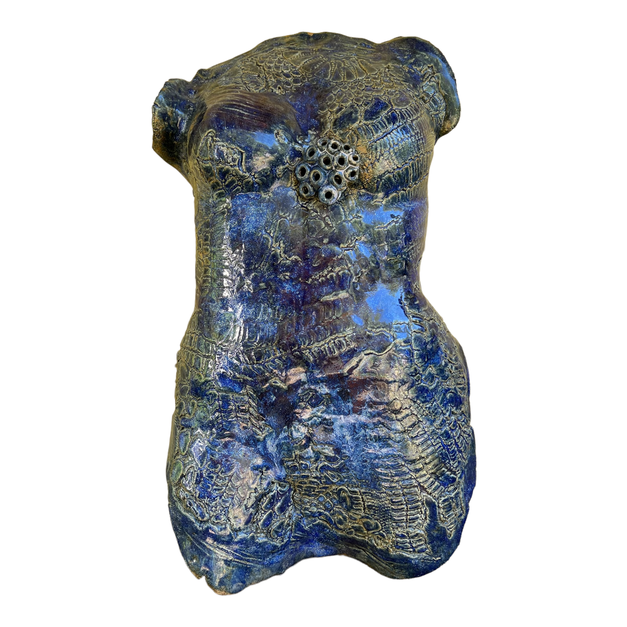 A ceramic sculpture of a female torso with blue and green colors and intricate textures by local ceramicist Rick Van Dyke.