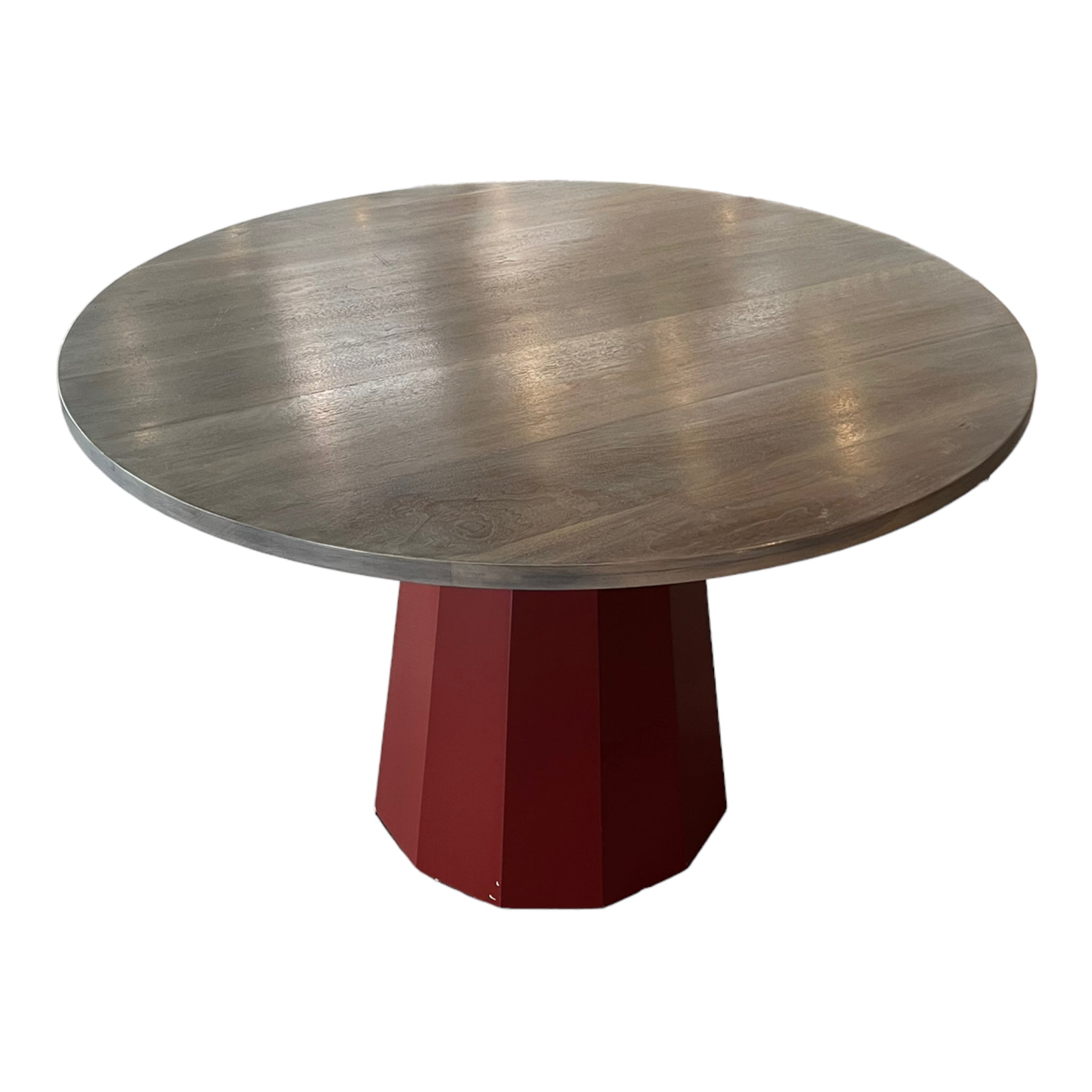A Robert Wymer round dining table with a custom walnut veneer top and a solid hand cut walnut base painted in burgundy and gray tones.