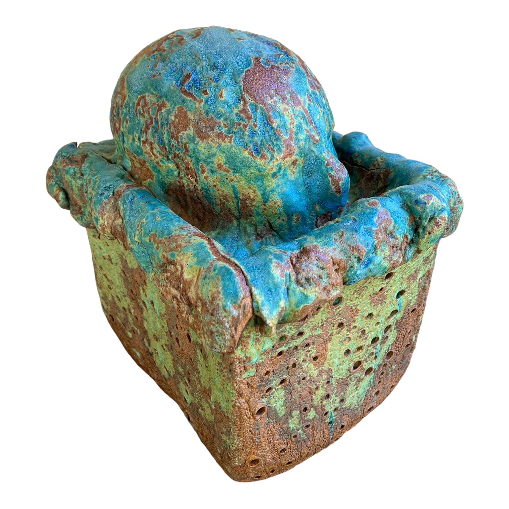 A sculpture of a creature with blue and green colors on a brown base, created by Rick Van Dyke.