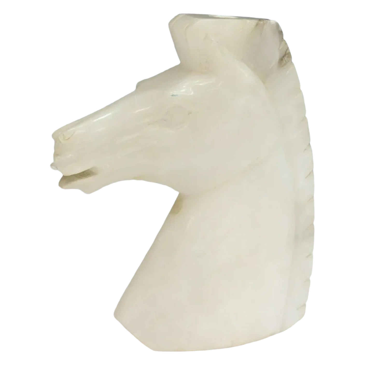Carved white alabaster sculpture of a horse's head with a roached mane, drilling hole through the center.
Vintage Italian Alabaster Horse Sculpture