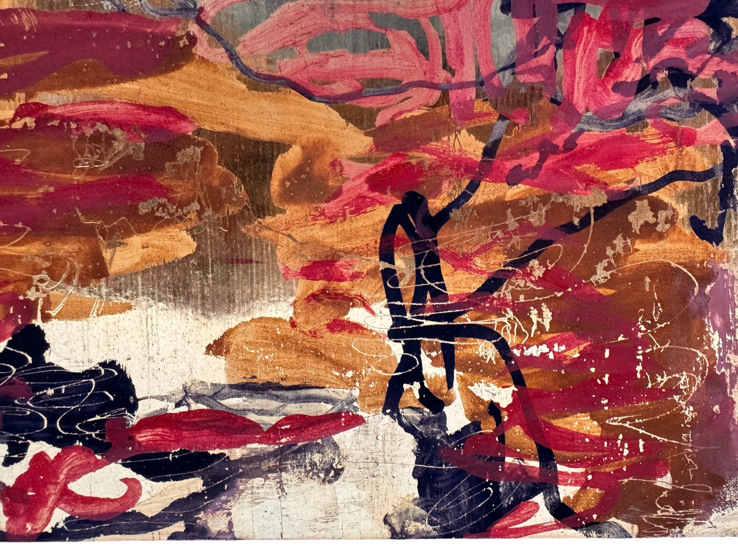 A vibrant abstract painting on a metallic gold-toned panel characterized by dense, energetic layering. The palette is dominated by saturated pinks, deep blacks, and earthy oranges.
In the upper half, horizontal strokes of orange and pink suggest a sunset or landscape, while the lower half features heavy, gestural applications of black paint that anchor the composition. Fine, white or silver linear scribbles are scratched into or layered over the pigment, adding a sense of frantic movement.