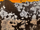 An abstract, vertical-oriented canvas painting featuring a dark background layered with highly textured, horizontal bands. The composition alternates between solid black strips and dense, speckled white-and-grey patterns that resemble static or stone texture. Splattered across the surface are energetic drips, lines, and splotches of bright yellow, stark white, and grey paint, creating a chaotic yet rhythmic sense of movement overlaying the geometric structure underneath.