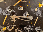 An abstract, vertical-oriented canvas painting featuring a dark background layered with highly textured, horizontal bands. The composition alternates between solid black strips and dense, speckled white-and-grey patterns that resemble static or stone texture. Splattered across the surface are energetic drips, lines, and splotches of bright yellow, stark white, and grey paint, creating a chaotic yet rhythmic sense of movement overlaying the geometric structure underneath.