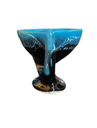 Complete mid-century ceramic tea set with teapot, sugar bowl, cups, and saucers, featuring a bold blue and black "lava drip" glaze reminiscent of Vallauris pottery.