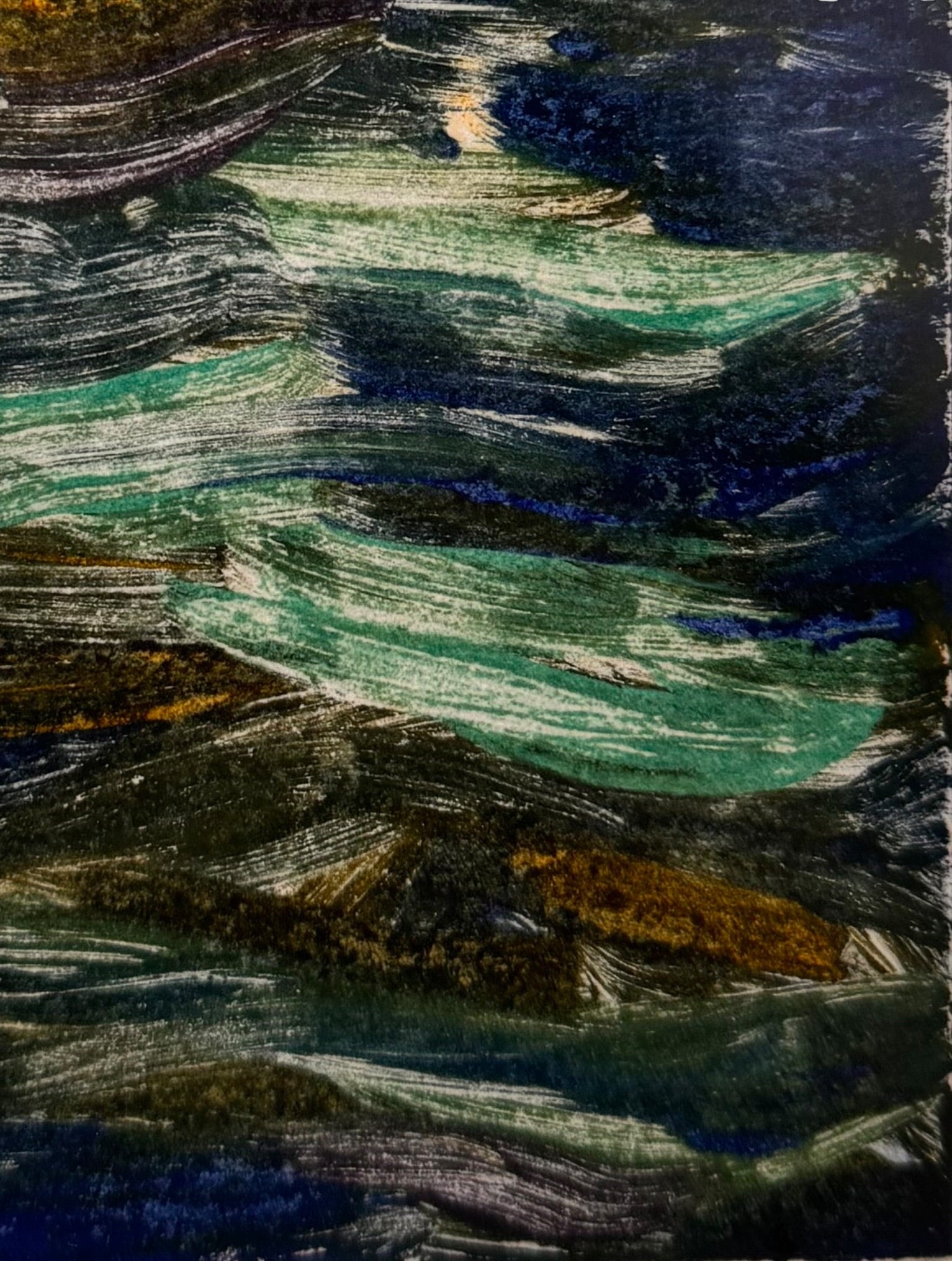 A vertical rectangular artwork, "Embers," by Jill London (2003), framed in a wide, textured gold frame. The piece features a small, abstract expressionist print at the center, rendered in dark, painterly strokes of deep blues, browns, yellows, and white, resembling moving water or smoke. Below the print, on the cream mat, the artist's signature, title, and date are hand-written in pencil. The paper has a delicate, textured deckled edge.
