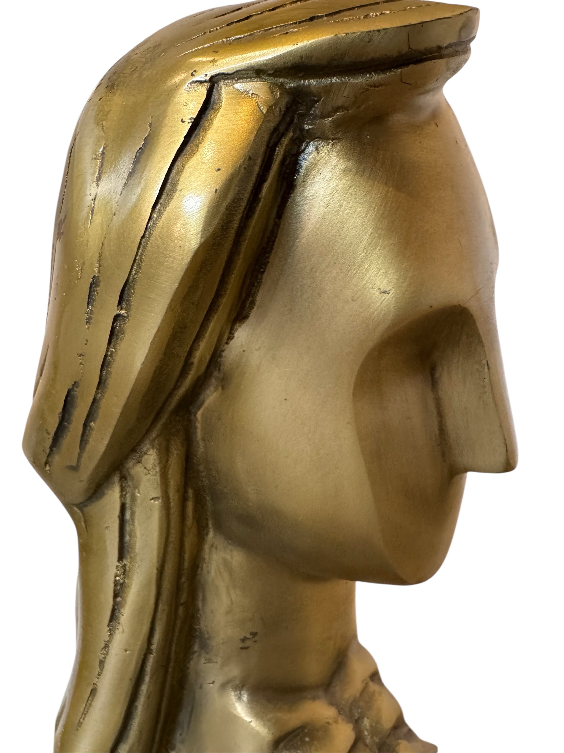 Cast bronze bust of a woman, mid-century Korean design, on a dark wood base. The figure has stylized flowing hair and no mouth.