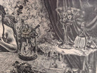 A black-and-white lithograph titled Victoria by the artist Zsissly. A woman with a veil over her dark hair sits directly facing the viewer behind a highly detailed, round dining table crowded with objects. Every inch of the scene is densely textured, depicting a bowl of bananas and grapes, an ice bucket with wine bottles, crystal glassware, a decanter, and a patterned lace tablecloth. The background features intricate floral wallpaper, a paneled door, and heavy drapes. The style is eerie and densely shaded 