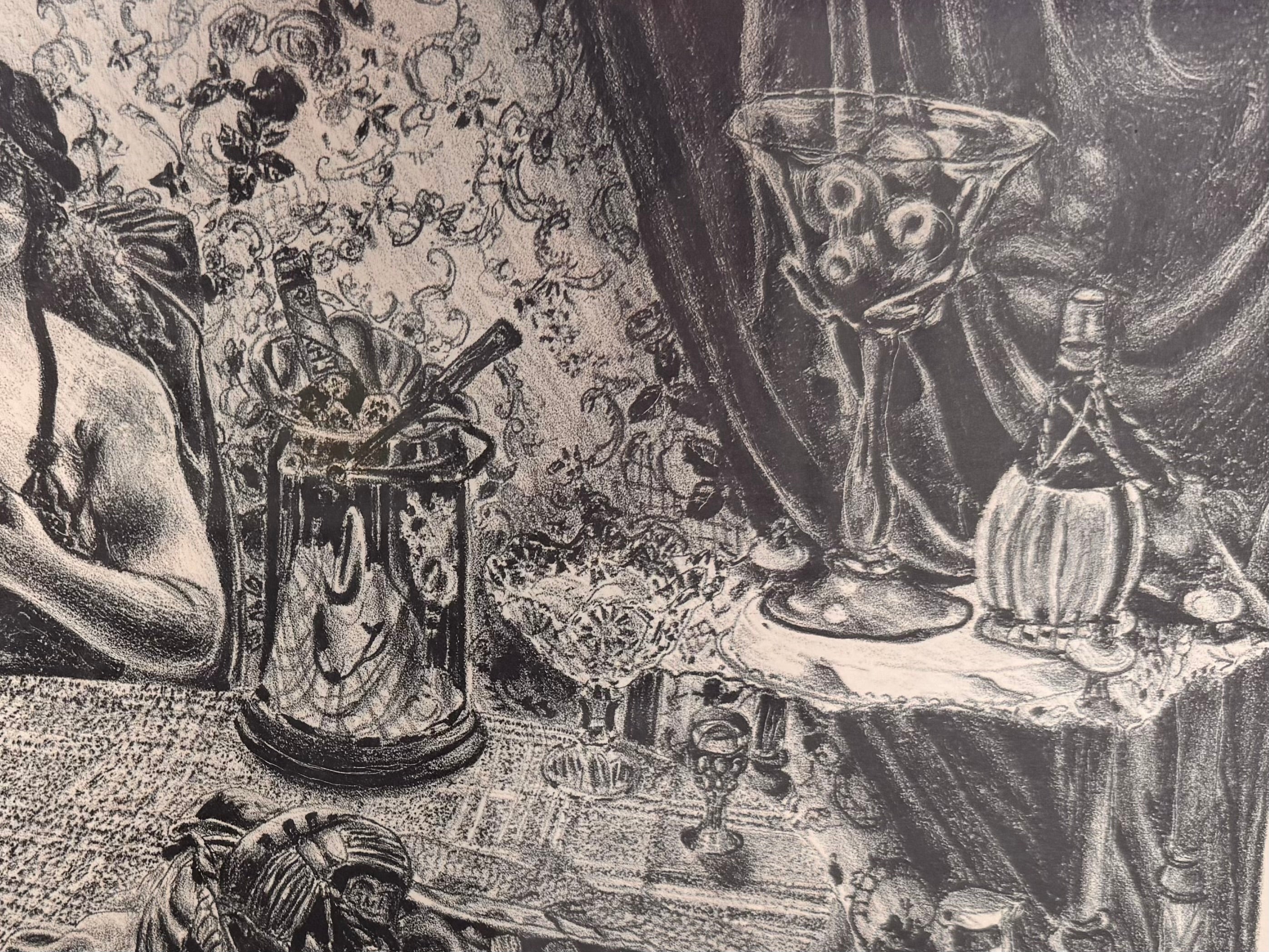 A black-and-white lithograph titled Victoria by the artist Zsissly. A woman with a veil over her dark hair sits directly facing the viewer behind a highly detailed, round dining table crowded with objects. Every inch of the scene is densely textured, depicting a bowl of bananas and grapes, an ice bucket with wine bottles, crystal glassware, a decanter, and a patterned lace tablecloth. The background features intricate floral wallpaper, a paneled door, and heavy drapes. The style is eerie and densely shaded 