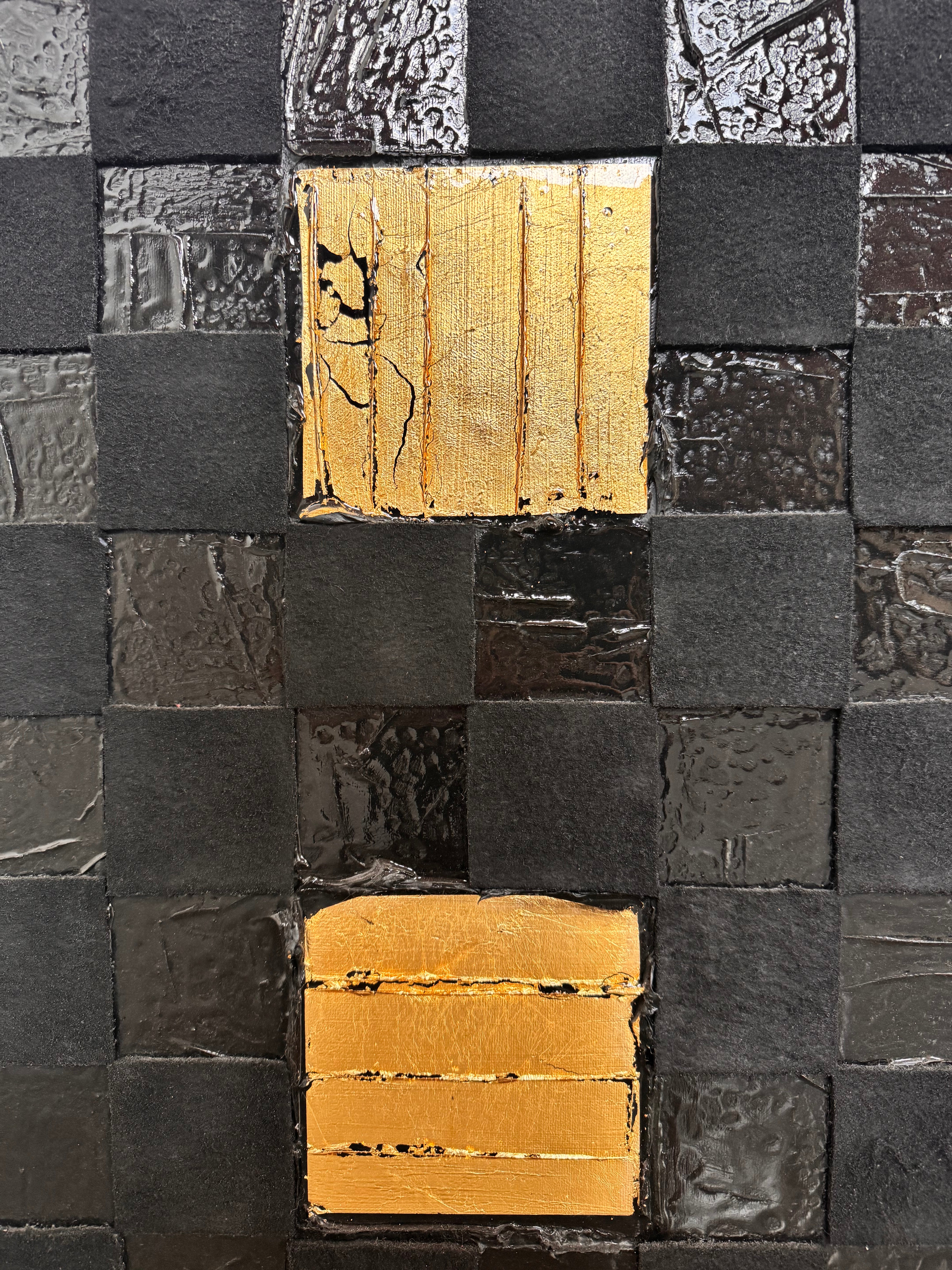 A triptych of abstract paintings featuring a grid pattern of textured black squares by Sabine Stromeyer called “Square One”. The left and right panels each have a single vertical gold rectangle in the center, while the middle panel has two stacked gold rectangles in the center.