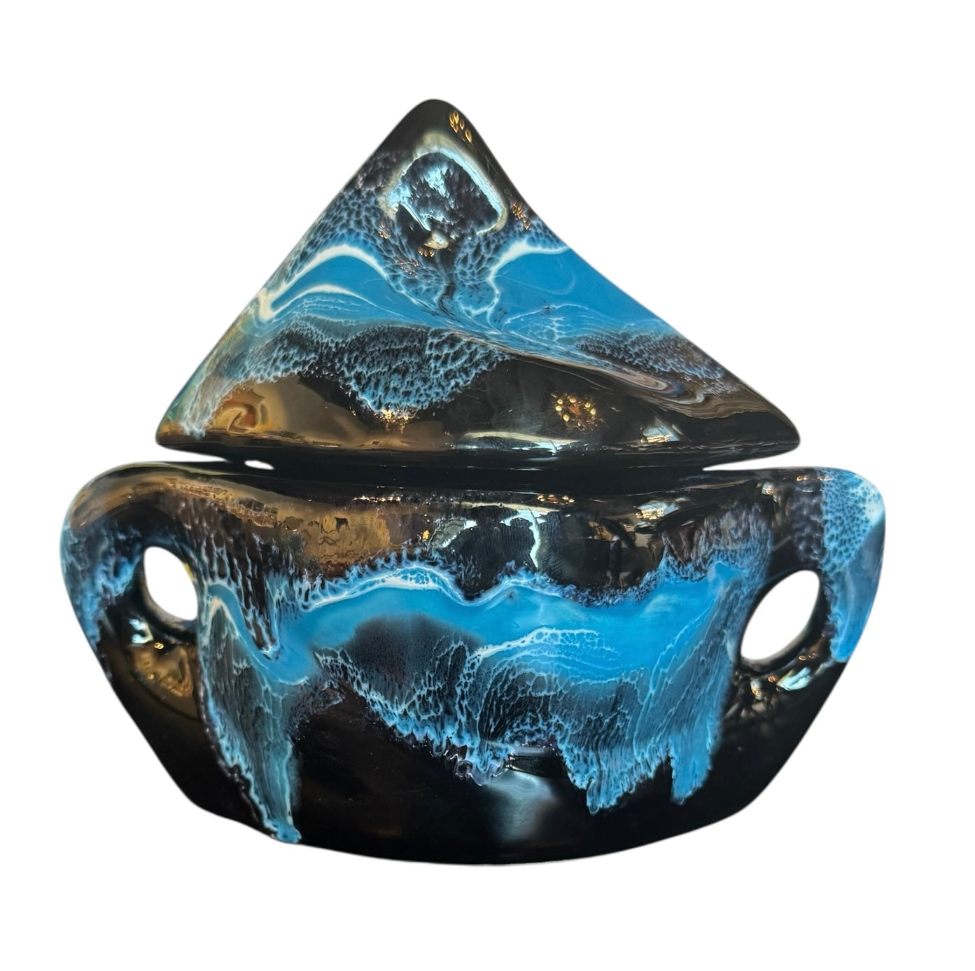 Complete mid-century ceramic tea set with teapot, sugar bowl, cups, and saucers, featuring a bold blue and black "lava drip" glaze reminiscent of Vallauris pottery.