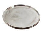Round St. James silver-plated lidded serving dish from the 1980s, featuring a minimalist modernist design with geometric side handles and a sculptural, biomorphic finial, showing visible vintage wear and pitting on the metallic surface.