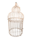 A single, white or cream-colored, decorative wrought iron bird cage with a hinged door and a hanging loop at the top. The cage has a vintage or antique style 