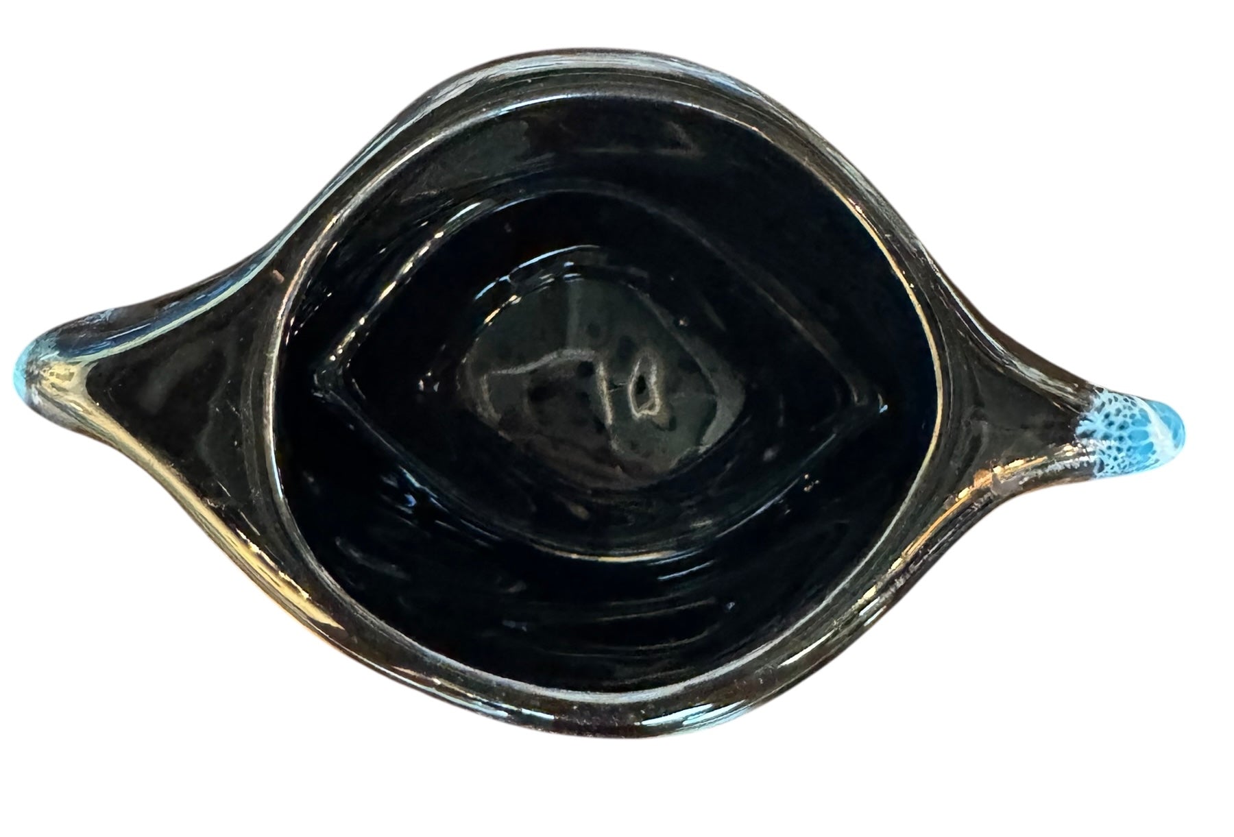 Complete mid-century ceramic tea set with teapot, sugar bowl, cups, and saucers, featuring a bold blue and black "lava drip" glaze reminiscent of Vallauris pottery.