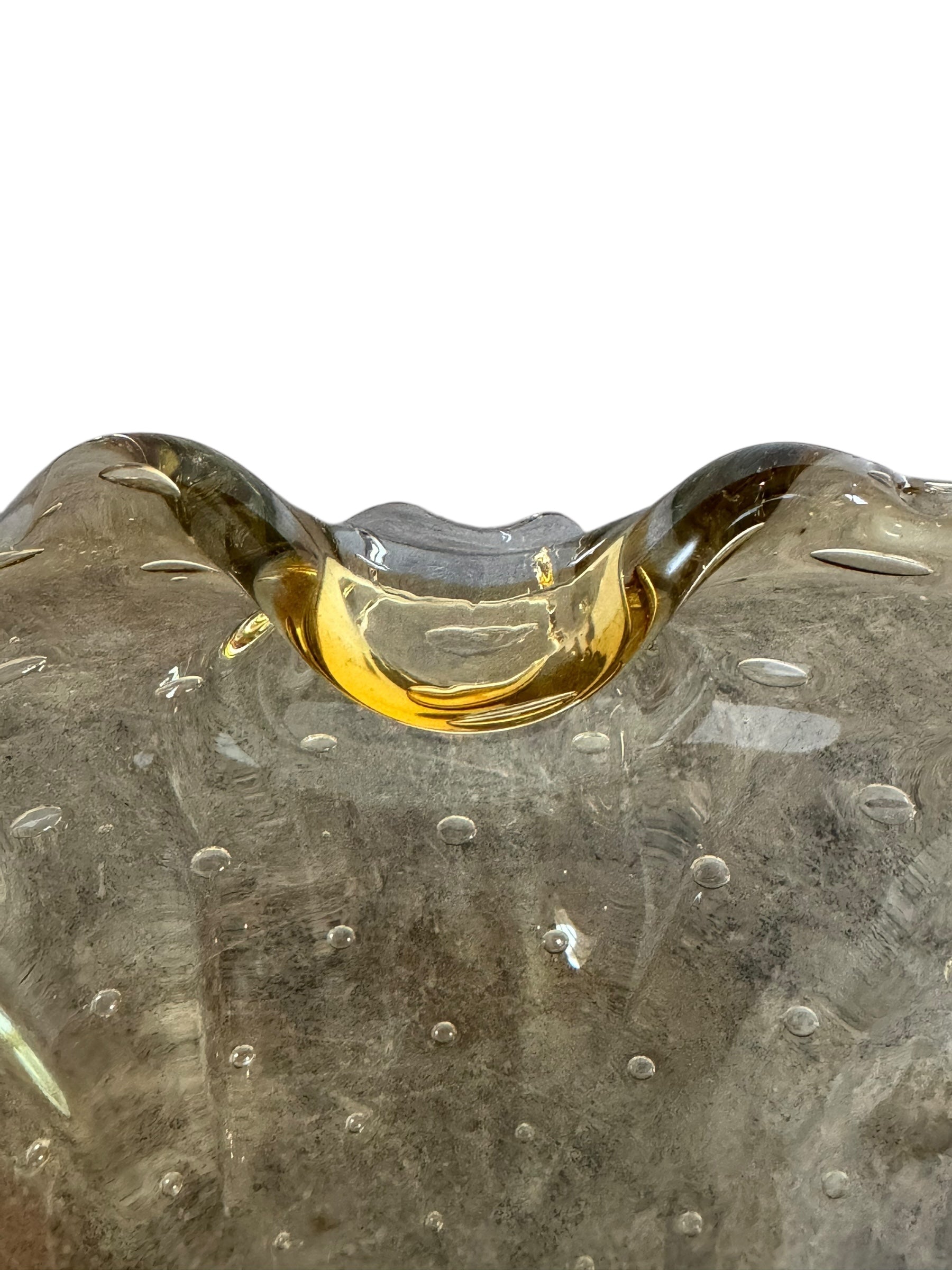 Scalloped amber yellow art glass ashtray with controlled bubbles