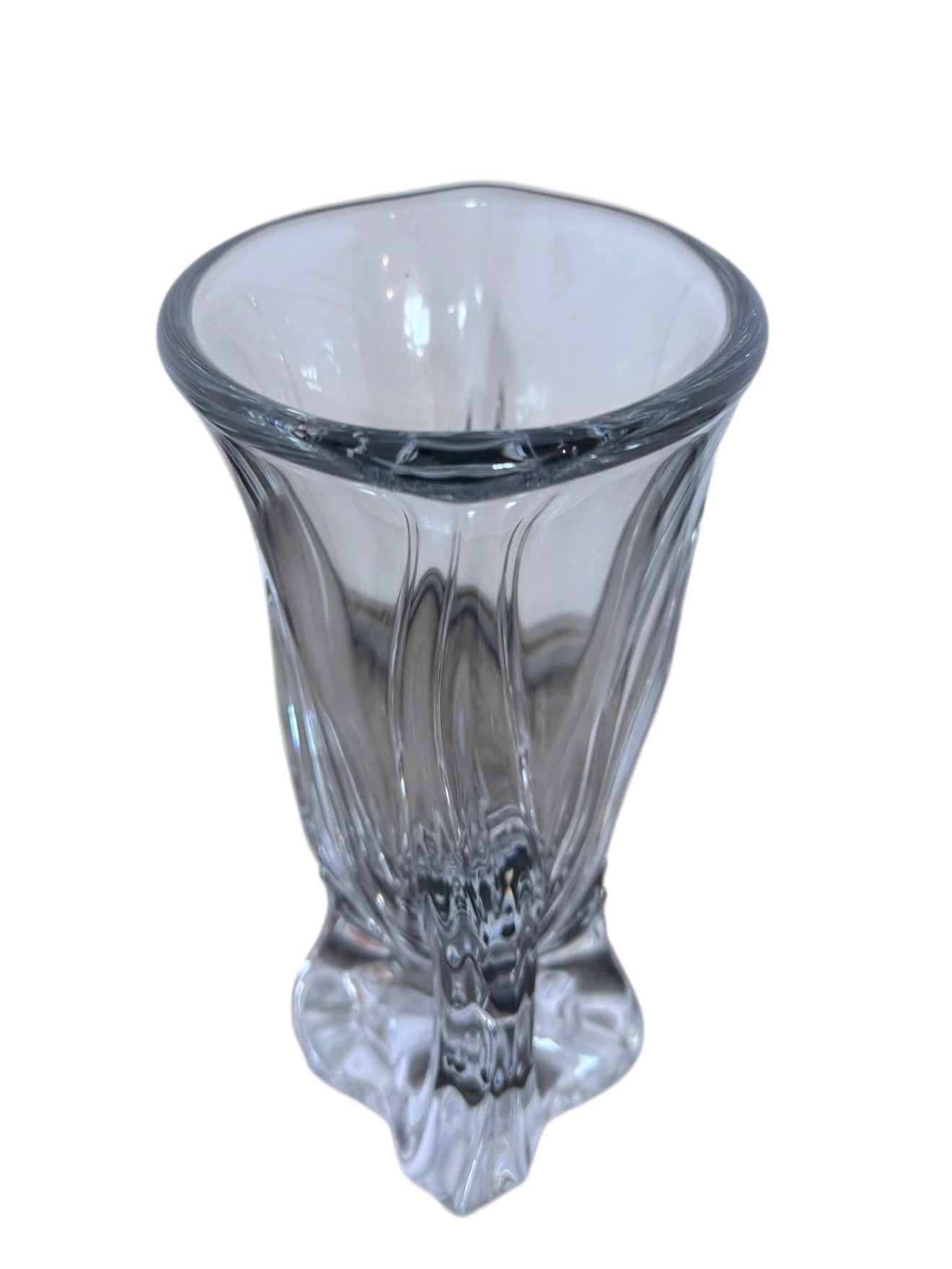 A clear crystal vase with a flared opening and a twisted, sculptural base.
The provided image is of a vintage Vannes Le Châtel crystal vase, which is a piece of French art glass