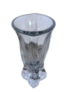 A clear crystal vase with a flared opening and a twisted, sculptural base.
The provided image is of a vintage Vannes Le Châtel crystal vase, which is a piece of French art glass