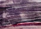 A horizontal, rectangular abstract print titled "Night Water" centered within a white mat and a thin gold frame. The artwork features dense, textured horizontal brushstrokes in deep shades of violet, indigo, and black. A prominent, gestural streak of vibrant red and a softer blush-pink band cut across the dark "water," suggesting a sunset reflection or light hitting a dark surface. The artist's signature, title, and the year 2004 are visible in pencil at the bottom.