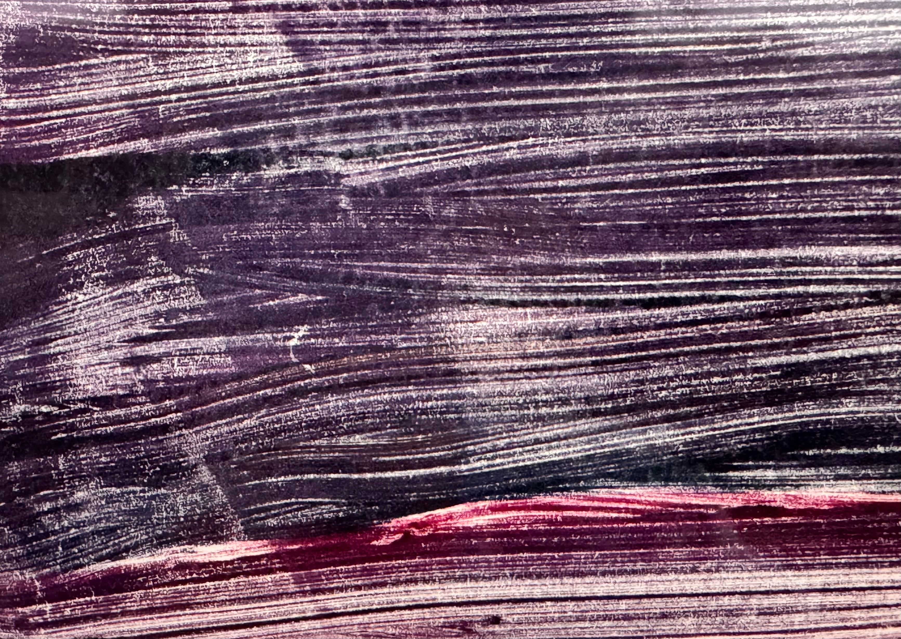 A horizontal, rectangular abstract print titled "Night Water" centered within a white mat and a thin gold frame. The artwork features dense, textured horizontal brushstrokes in deep shades of violet, indigo, and black. A prominent, gestural streak of vibrant red and a softer blush-pink band cut across the dark "water," suggesting a sunset reflection or light hitting a dark surface. The artist's signature, title, and the year 2004 are visible in pencil at the bottom.
