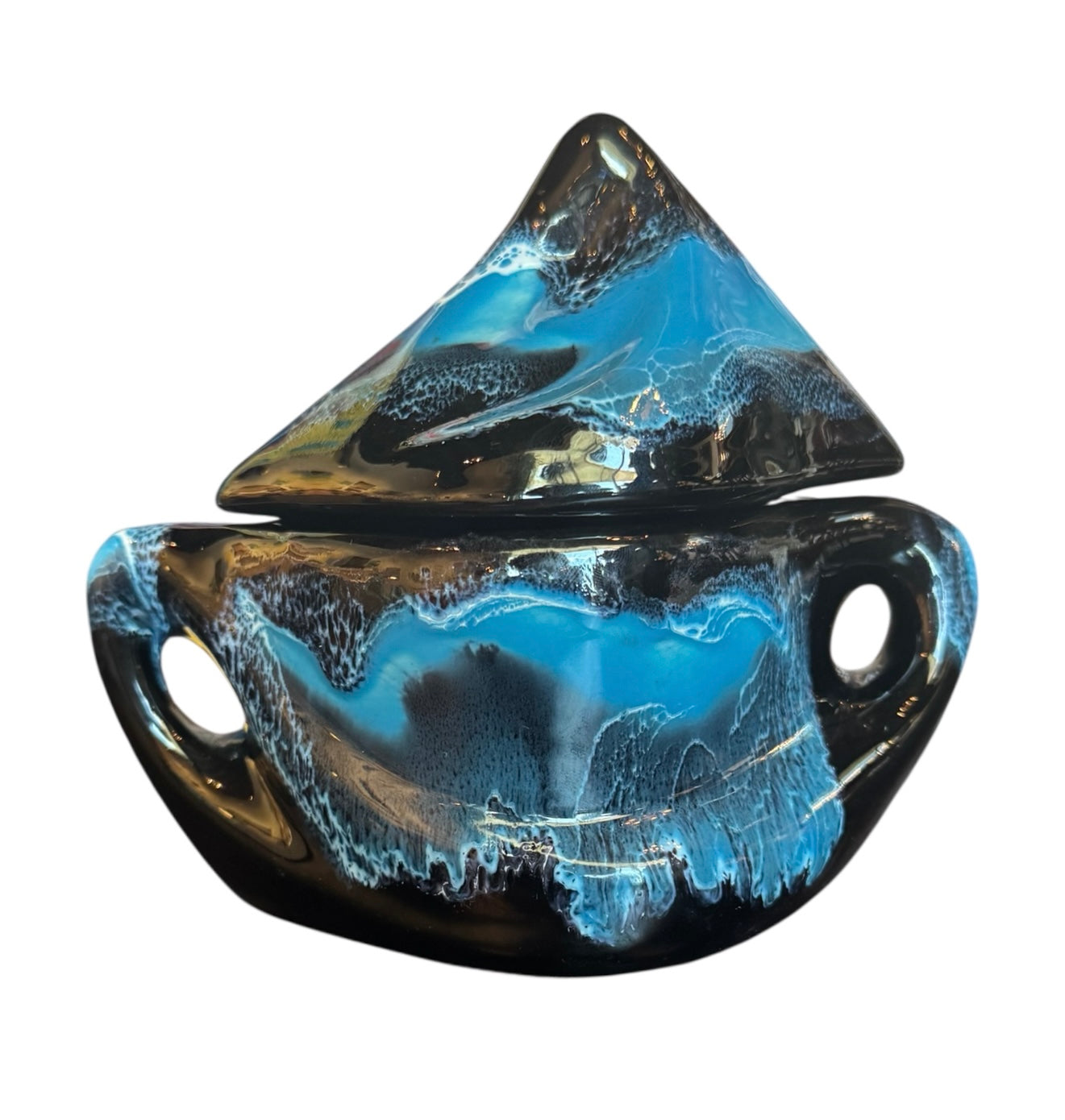 Complete mid-century ceramic tea set with teapot, sugar bowl, cups, and saucers, featuring a bold blue and black "lava drip" glaze reminiscent of Vallauris pottery.