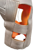 Carved, rib-like vertical lines cover the lower two-thirds of the form, with some sections resembling stacked bricks or tire treads. A subtle metallic silver finish catches the light on the right half, contrasting with the chalky finish on the left. The top third of the sculpture is a smooth, rounded cap. Rectangular cutouts on both sides pierce through the outer layer, revealing a hollow interior glowing with vibrant, airbrushed gradients of neon pink, orange, yellow, and green.