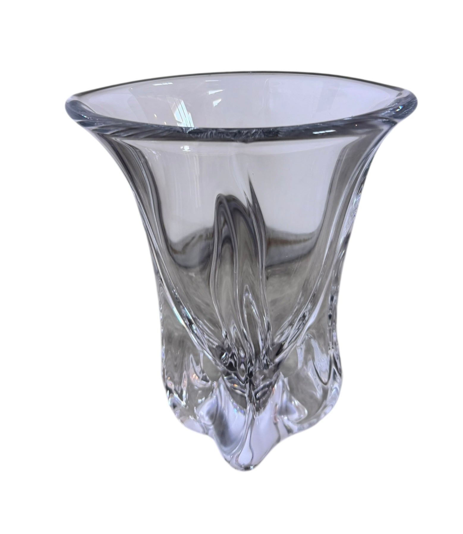 A clear crystal vase with a flared opening and a twisted, sculptural base.
The provided image is of a vintage Vannes Le Châtel crystal vase, which is a piece of French art glass