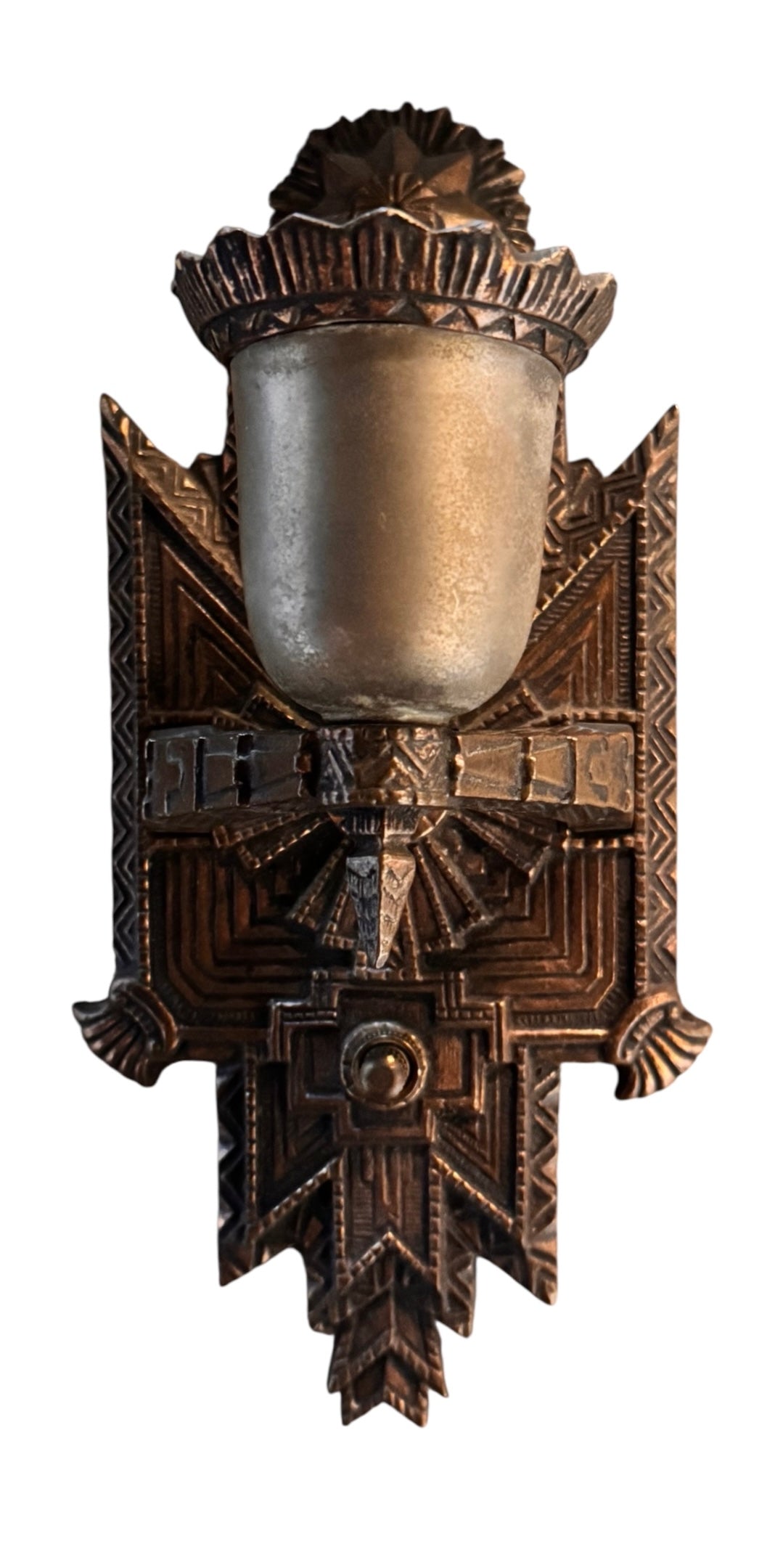 Pair of Art Deco sconces, circa 1930, in cast metal with geometric designs, professionally rewired