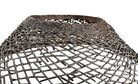 A round metal wall sculpture by Michael Aram, viewed from the front against a stark white background. The piece is composed of a dense, intricate lattice of fine, dark metal wire or twigs woven together to create a textured, web-like pattern. The structure curves inward like a funnel or a vortex, sloping down toward a clean, circular opening in the exact center, creating a strong sense of depth and dimensionality.