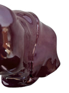 A glossy, dark chocolate brown ceramic bust of a Labrador dog. Created by Enza Fasano, the sculpture features a minimalist, stylized design with smooth, flowing lines and a high-shine glaze that reflects light. The dog’s long ears drape down the sides, and its snout is rounded, capturing the gentle essence of the breed in a contemporary Italian pottery style.