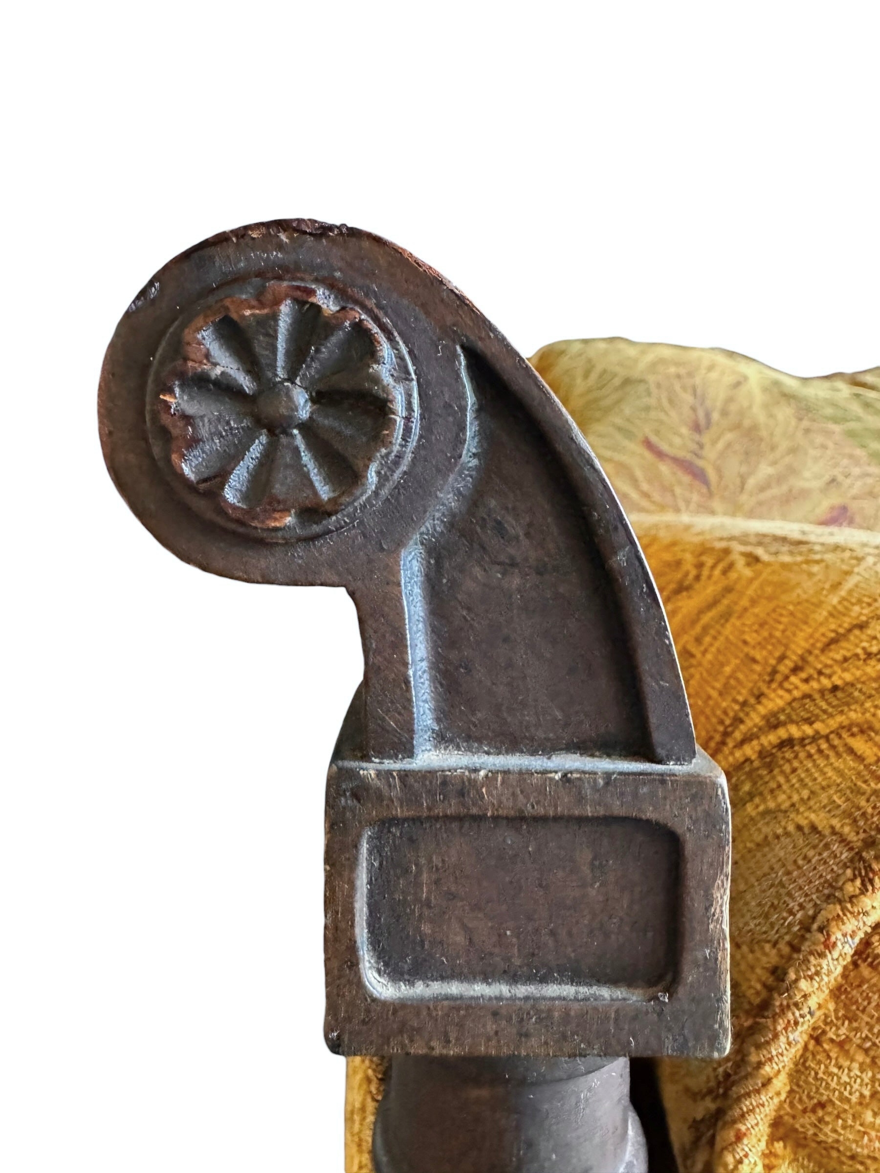 A Neoclassical-style wooden loveseat with a dark mahogany frame featuring scrolled arms and tapered legs. The upholstery consists of plush cushions and two matching cylindrical bolster pillows, all covered in a golden-yellow jacquard fabric with a large-scale, repeating autumnal leaf pattern in shades of muted orange and brown.