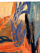 A vertical abstract painting on a shimmering gold-leaf background. The piece is filled with energetic, calligraphic scribbles and fluid shapes in vibrant orange, deep teal, and touches of red. The brushwork varies from thick, opaque strokes to thin, wiry lines that dance across the reflective surface. The composition feels organic and chaotic, like a dense thicket or a fire.
