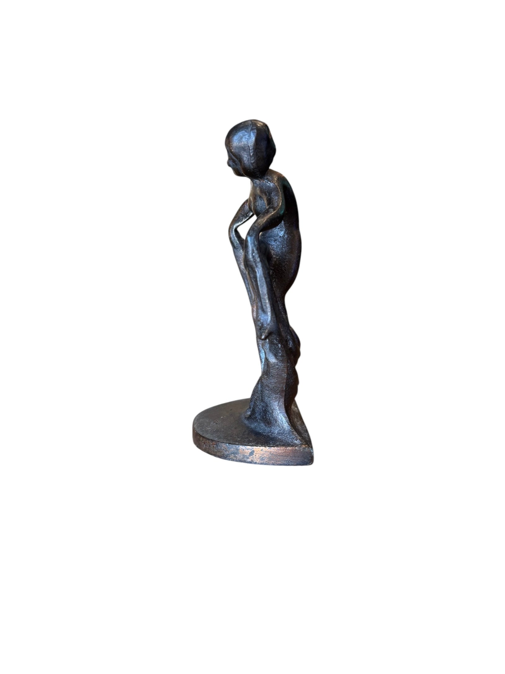 Two cast iron bookends in the Art Deco style. Each features a nude female figure leaning gracefully with one leg extended, posed atop a stylized wave or drape. The bookends have a bronze-colored finish and a vintage appearance.
