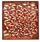 Geometric abstract painting, 'Radiating Blocks' by Robert Wymer, using warm tones of red, orange and white on mahogany plywood. The composition features layered, angular blocks and incised lines, presented in a carved mahogany frame.