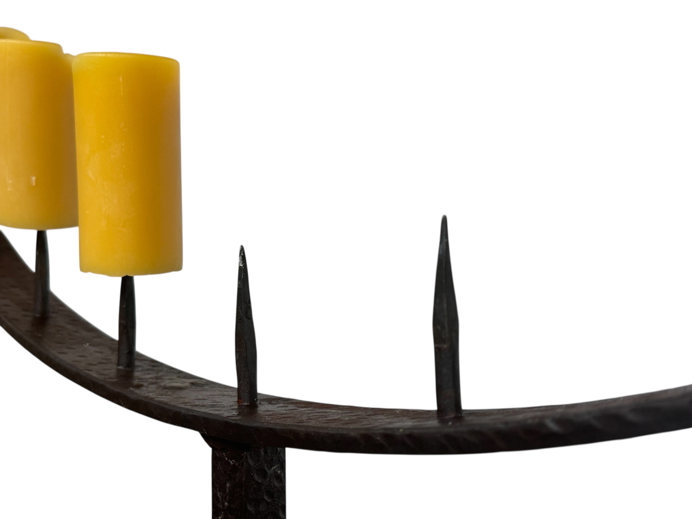  Tall, free-standing Spanish Revival wrought iron candelabra with seven candle prickets holding beeswax candles.