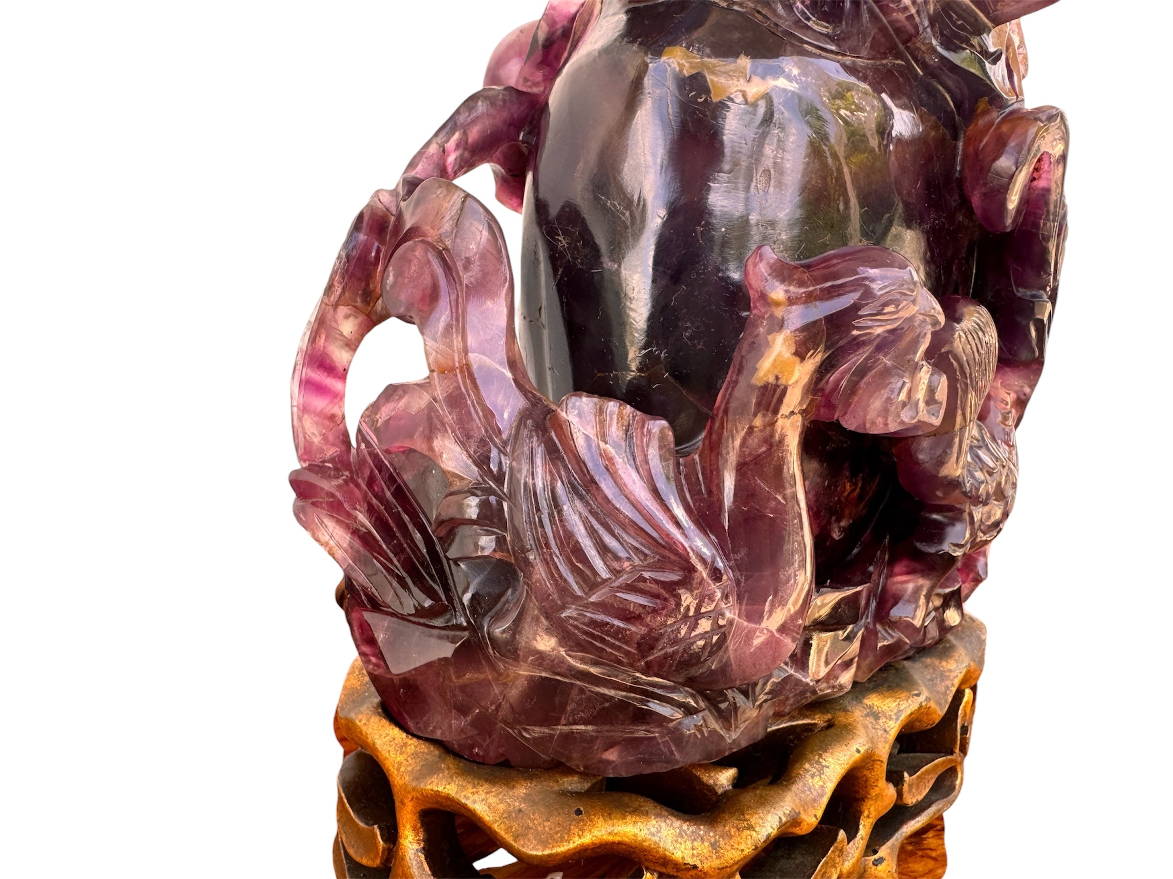 An antique Chinese table lamp featuring a base hand-carved from deep purple amethyst stone, topped with a clear quartz crystal neck. The lamp sits on an ornate, custom gilt-bronze Chinoiserie base and features a flared, cream-colored silk lampshade still enclosed in protective plastic. A rectangular brass finial sits at the very top.