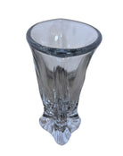 A clear crystal vase with a flared opening and a twisted, sculptural base.
The provided image is of a vintage Vannes Le Châtel crystal vase, which is a piece of French art glass
