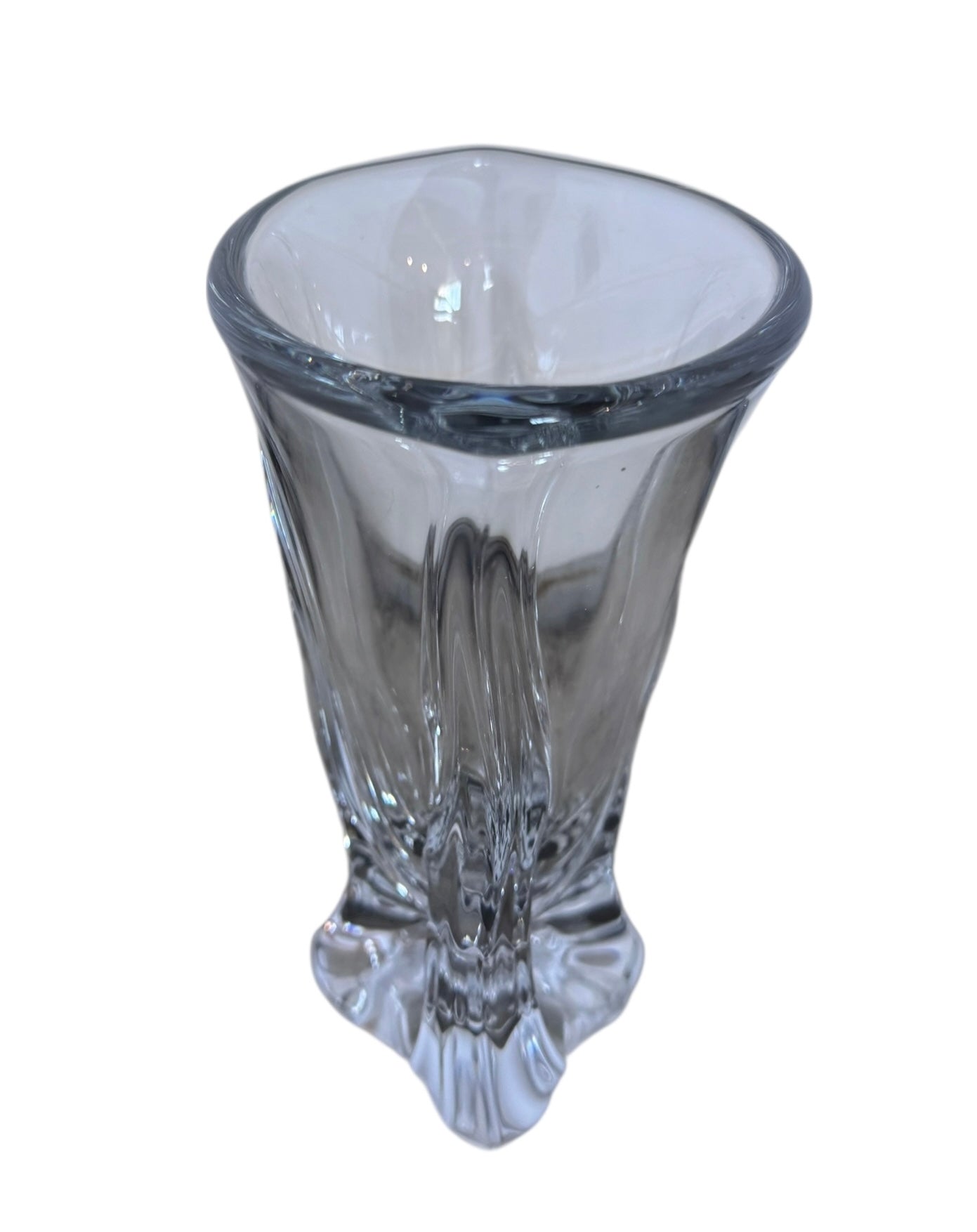 A clear crystal vase with a flared opening and a twisted, sculptural base.
The provided image is of a vintage Vannes Le Châtel crystal vase, which is a piece of French art glass