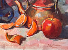 An oil painting still life featuring a copper teapot with a wooden handle, a blue glass vase, a red apple, a whole orange, and several orange slices, all arranged on a white tablecloth against a blurred purple and green background. The artist's signature "B. Willamson 2019" is visible in the bottom right corner.