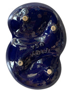 Vintage McCoy ashtray. Glazed in dark blue and marbled with lighter blues. The bottom is stamped 'McCoy USA.'"