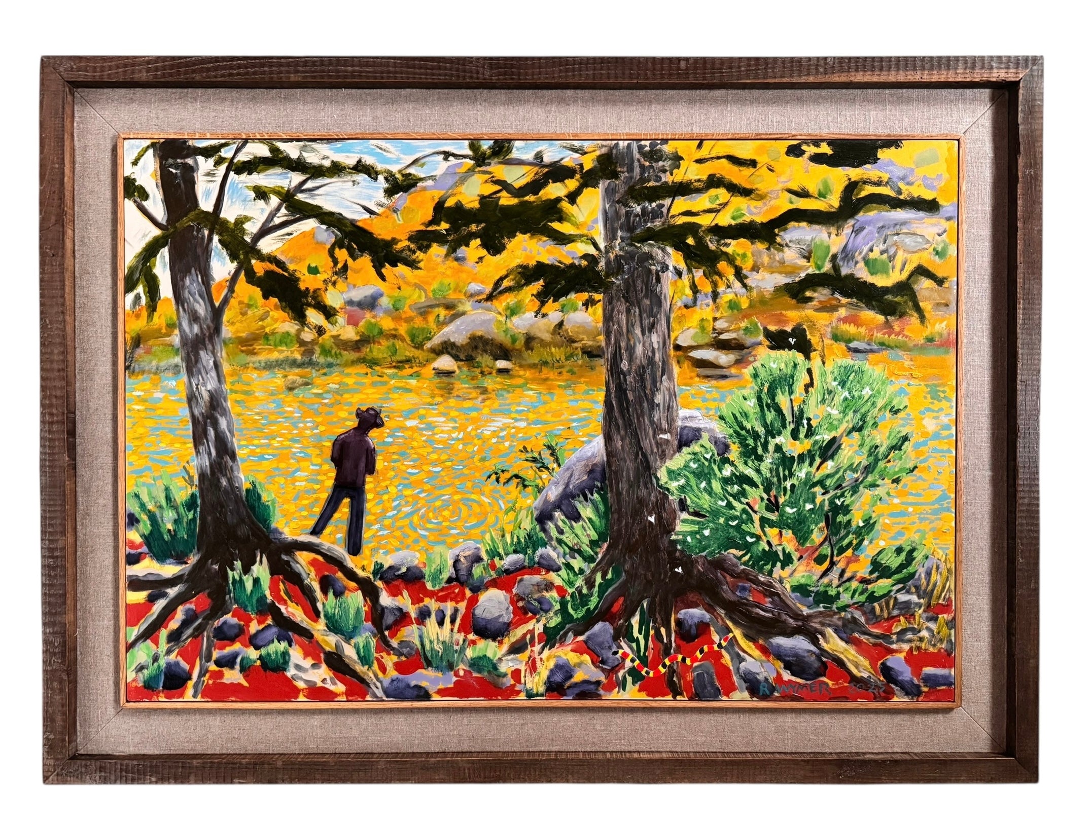 A vibrantly colored landscape painting titled 'Perdernales Falls Fisherman,' featuring two large trees with prominent exposed roots framing a body of water. A lone figure, a fisherman, stands by the water in the middle ground. The painting uses bold strokes of yellow, green, red, and blue, and is enclosed in a rustic dark wooden frame with a light-colored inner mat.