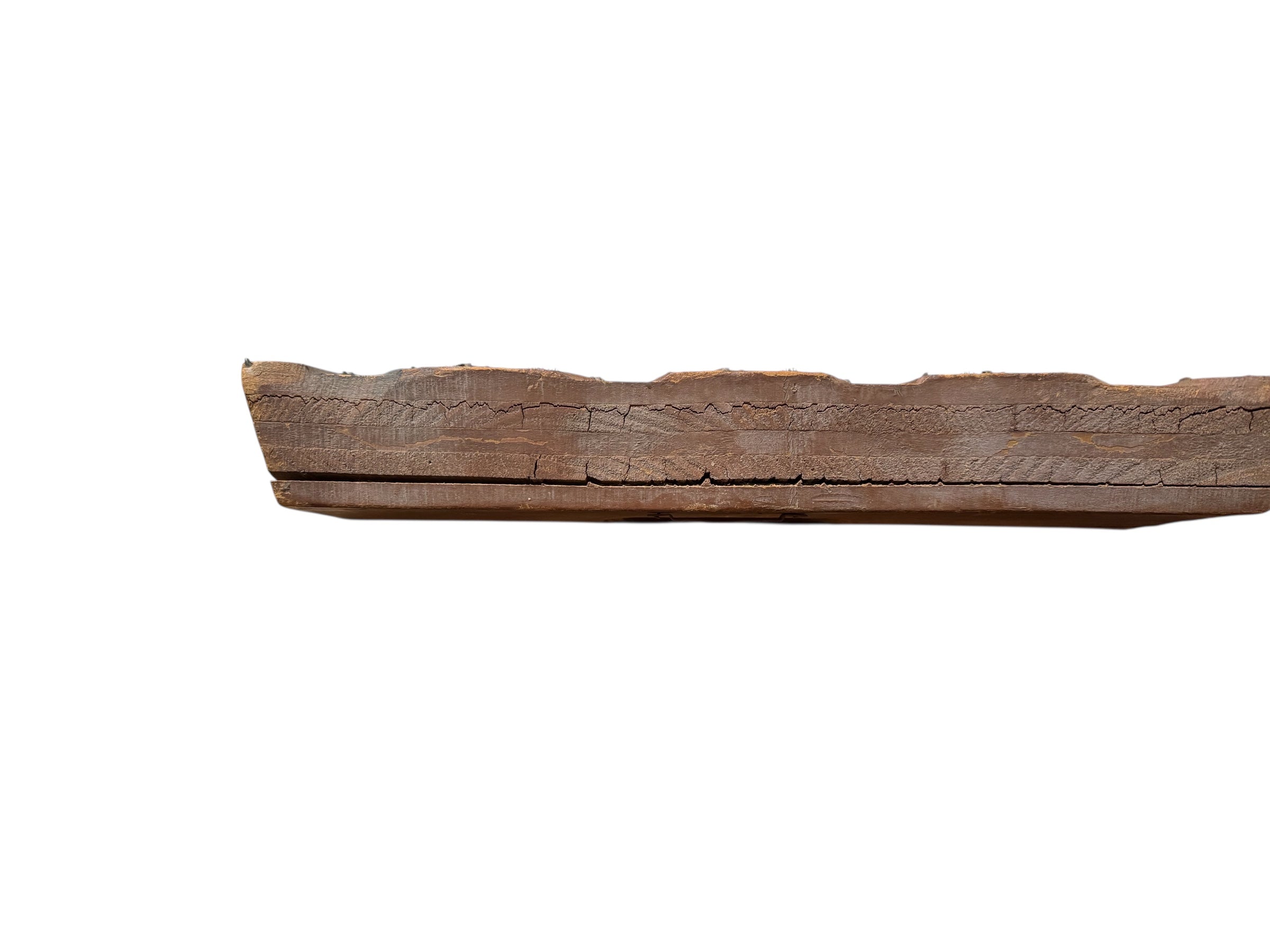 A vintage carved wooden printing block with intricate, repeating patterns, engraved with an unknown artist's signature and stamped "Made in France." The wood shows signs of age and wear, adding to its historical character