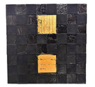 A triptych of abstract paintings featuring a grid pattern of textured black squares by Sabine Stromeyer called “Square One”. The left and right panels each have a single vertical gold rectangle in the center, while the middle panel has two stacked gold rectangles in the center.