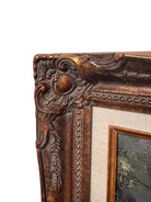 An oil painting still life featuring a copper teapot with a wooden handle, a blue glass vase, a red apple, a whole orange, and several orange slices, all arranged on a white tablecloth against a blurred purple and green background. The artist's signature "B. Willamson 2019" is visible in the bottom right corner.