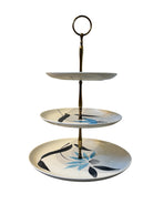 Three tier server Stetson creation, ceramic plates, brass stand, floral motifs, royal Tudor, mid-century modern, 1950s, tiered serving stand, Stetson creation