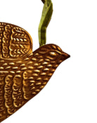 mage of a vintage-style, gilded tin bird with embossed feather detailing. A green velvet ribbon is attached. Front and back views shown.