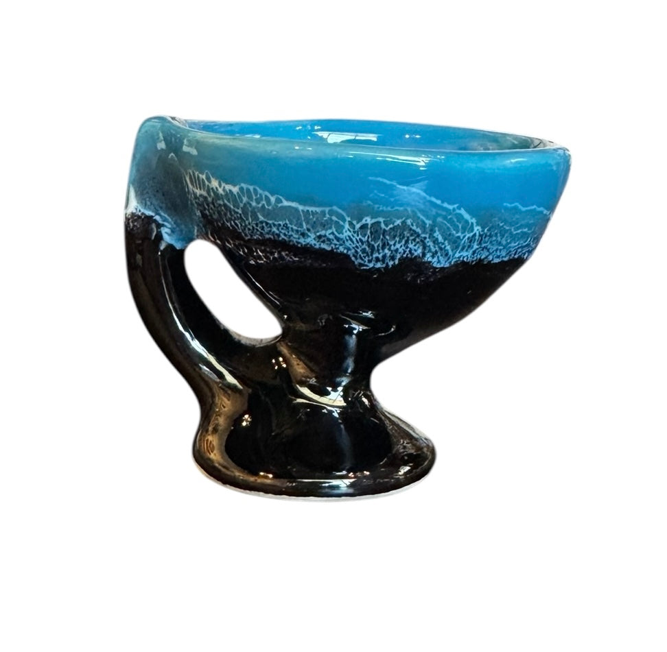 Complete mid-century ceramic tea set with teapot, sugar bowl, cups, and saucers, featuring a bold blue and black "lava drip" glaze reminiscent of Vallauris pottery.