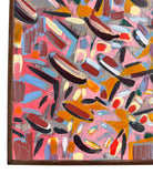 An abstract painting titled 'Cascade of Gold and Pink' by Robert Wymer, framed in dark wood. The artwork features a vibrant pink background densely covered with a dynamic arrangement of multi-directional, oblong, and dash-like brushstrokes in gold, red, blue, gray, white, and black.