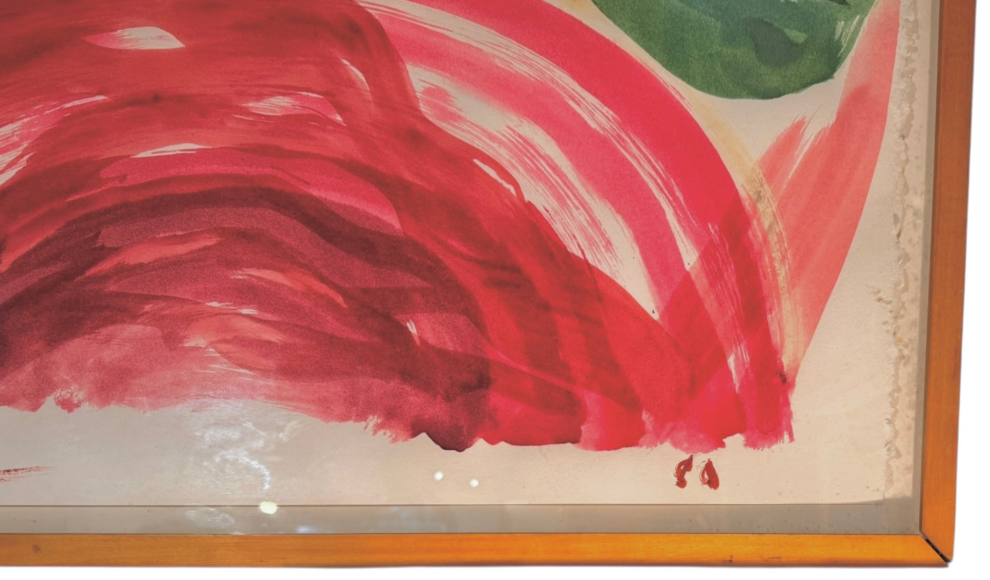 An abstract watercolor painting featuring a central red conical shape framed by large green arches, with a horizontal red wash at the bottom.