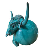 Glossy turquoise ceramic Ankole-Watusi sculpture with long, stylized horns and a nose ring.