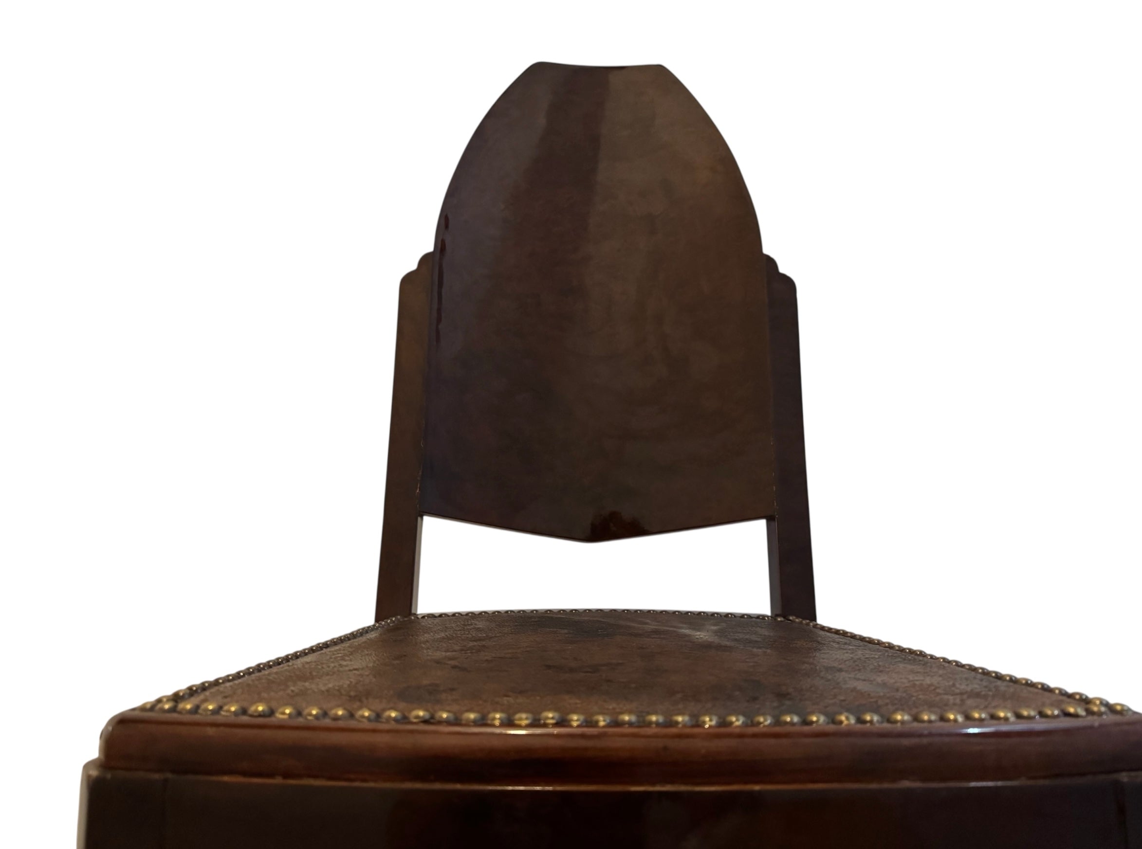  Art Deco chair featuring the leather upholstery, nail head trim, and mahogany frame.